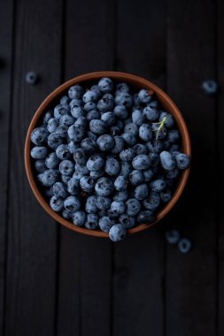 Fresh blueberry background, blueberries with space for text. Vegetarian concept. Berry textures. healthy eating