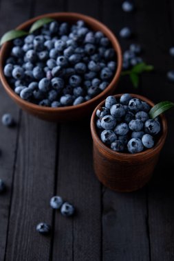 Fresh blueberry background, blueberries with space for text. Vegetarian concept. Berry textures. healthy eating