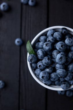 Fresh blueberry background, blueberries with space for text. Vegetarian concept. Berry textures. healthy eating