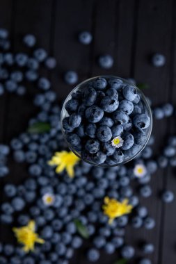 Fresh blueberry background, blueberries with space for text. Vegetarian concept. Berry textures. healthy eating
