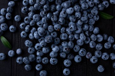 Fresh blueberry background, blueberries with space for text. Vegetarian concept. Berry textures. healthy eating