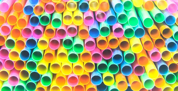 Colorful drinking straws close-up background, colorful plastic — Stock Photo, Image