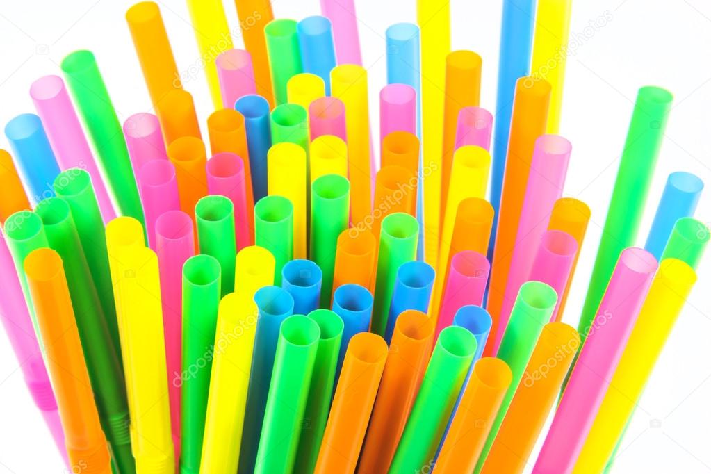 Colorful drinking straws close-up background, colorful plastic