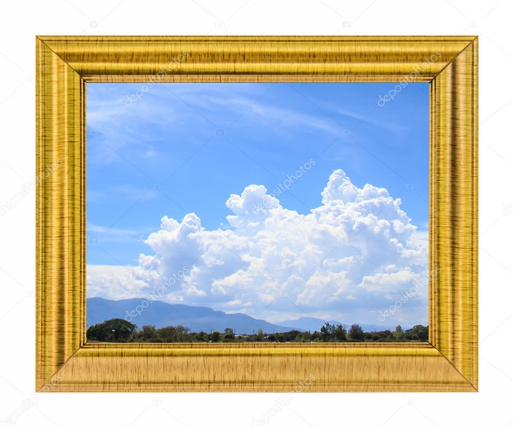 Clouds in the blue sky and mountain on golden frame