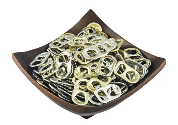 Ring pull aluminum of cans, in woden bowl — Stock Photo, Image