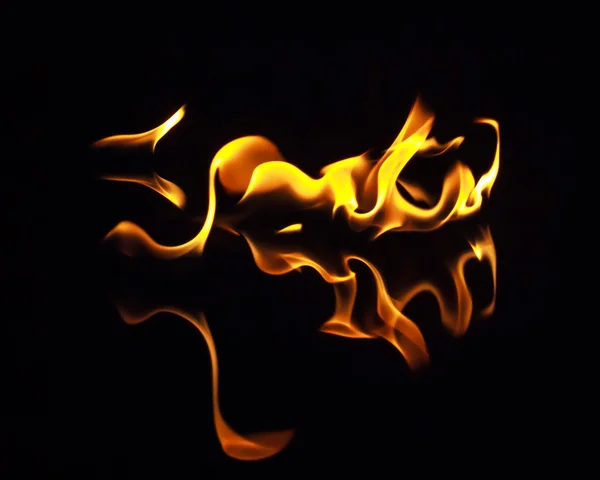 Fire flames on a black background — Stock Photo, Image