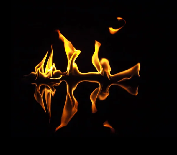 Fire flames on a black background — Stock Photo, Image