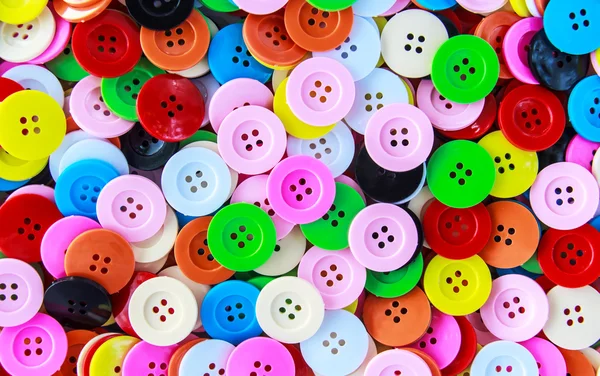 Färgglada knappar, färgglada clasper på nära håll — Stockfoto