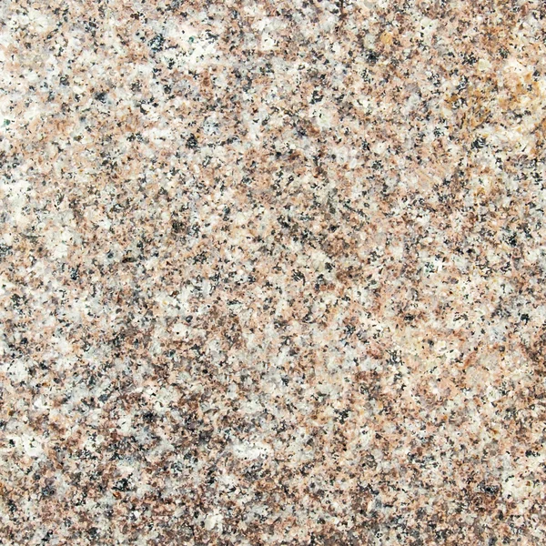 Granit de grain blanc et brun poli comme fond — Photo