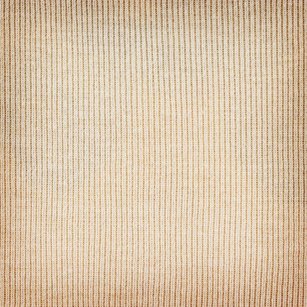 Light yellow knitted  fabric texture or background. — Stock Photo, Image