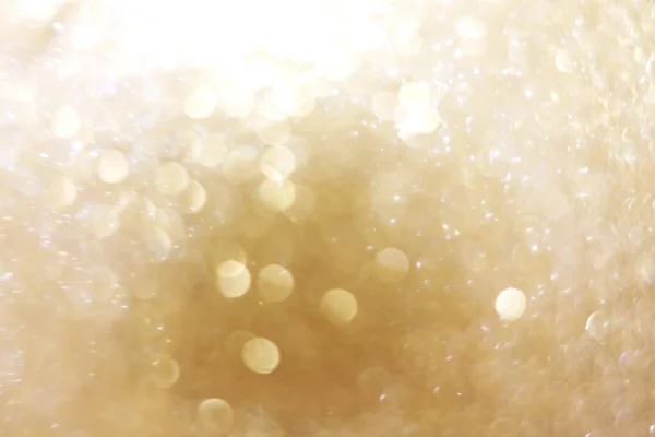 Gold sparkle glitter and copy space for Christmas background.