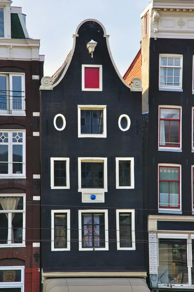 Black tight houses of Amsterdam — Stock Photo, Image