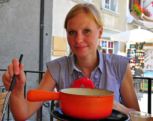 Tasting swiss fondue — Stock Photo, Image