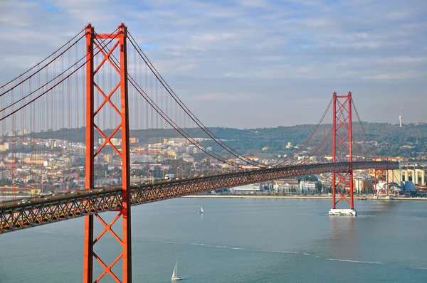 Ponte de Lisboa sobre o sol — Zdjęcie stockowe