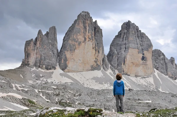 Boy looking at Three Peaks Royalty Free Stock Images