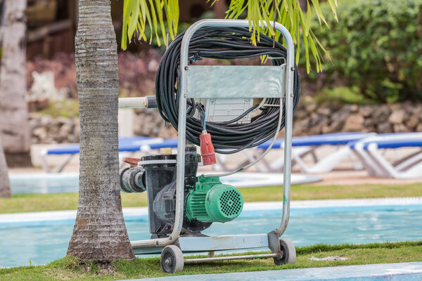 Old style technology swimming pool cleaning electrical pump