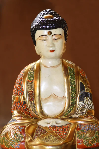 Old porcelains buddha figurine — Stock Photo, Image