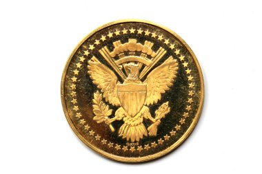 Back side of a gold coin President Kennedy