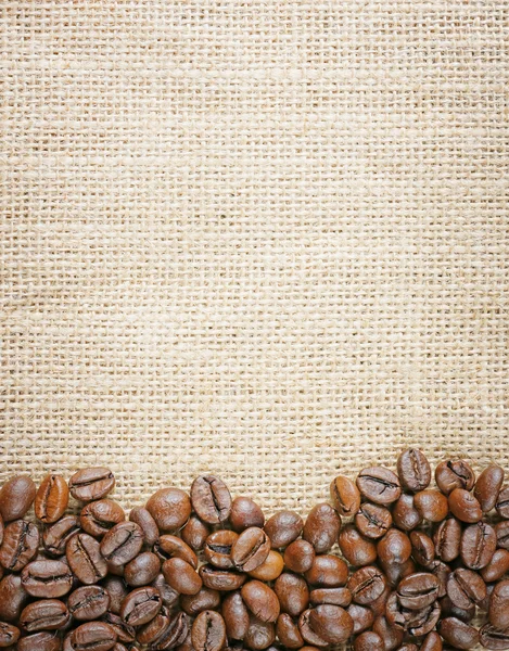 Kaffebönor juta bakgrund — Stockfoto