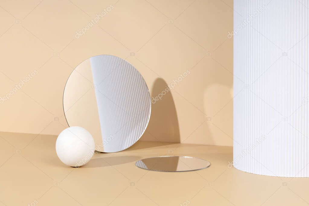 Skincare and cosmetic product showcase stand photography for online marketing include white wood ball and mirror stand on beige background