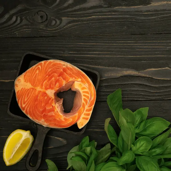 Salmon Steak Slices Lemon Basil Oil Wooden Surface Kitchen Table — Stock Photo, Image