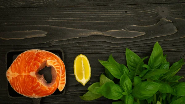 Salmon Steak Slices Lemon Basil Oil Wooden Surface Kitchen Table — Stock Photo, Image