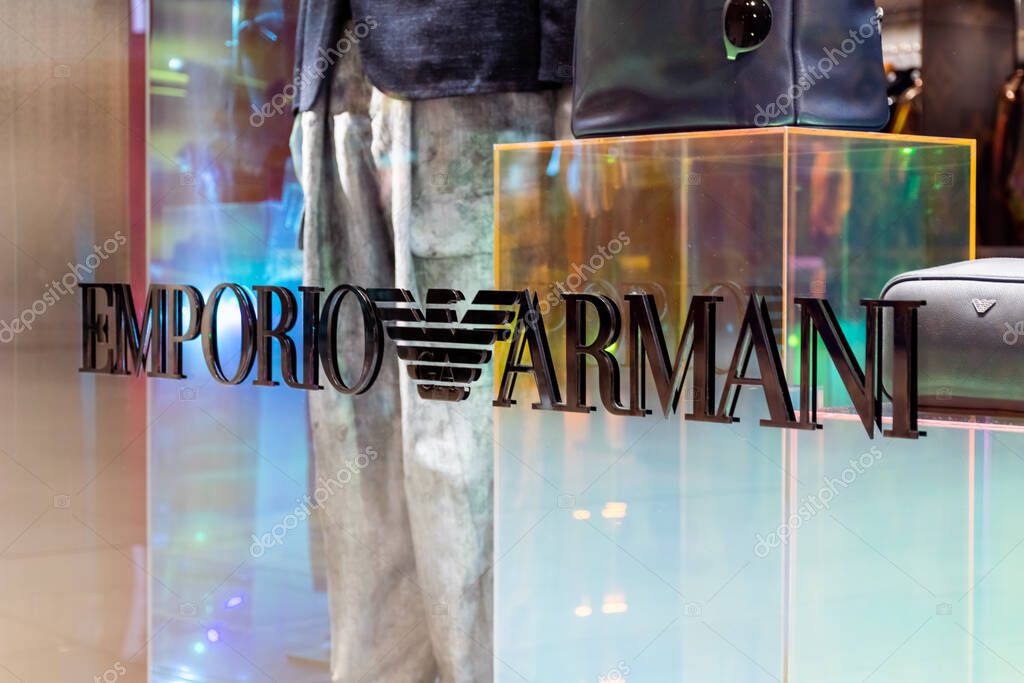 Dubai, United Arab Emirates- July 11, 2020: Emporio Armani logo in front of their store in Dubai Mall is an Italian luxury fashion design, manufacturers clothing and accessories founded in 1975