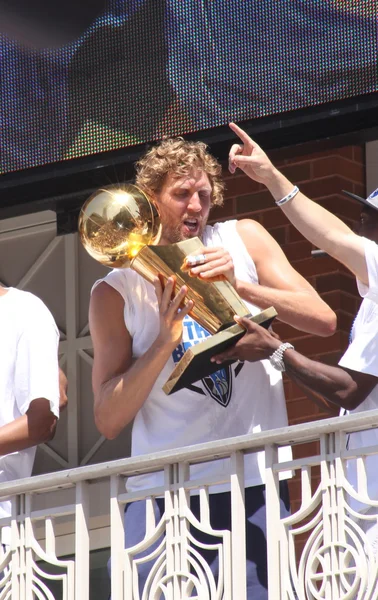 Dirk Nowitzki of the Dallas Mavericks NBA team carrying the NBA cup during the champions parade in Dallas Texas Royalty Free Stock Photos