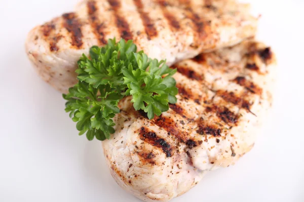 Grilled chicken breasts on a plate with fresh vegetables — Stock Photo, Image