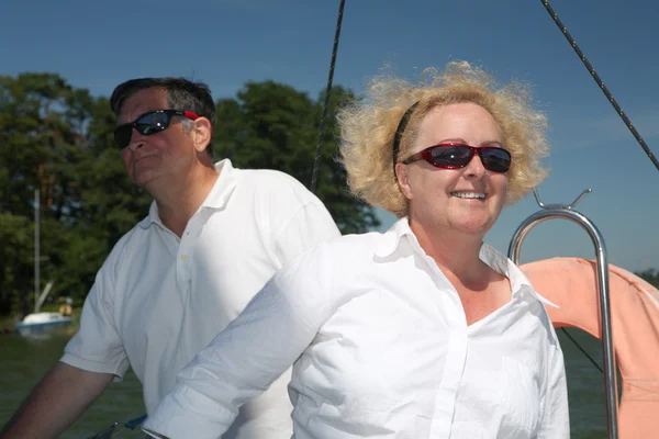 Middle-aged couple on boat sailing — Stock Photo, Image