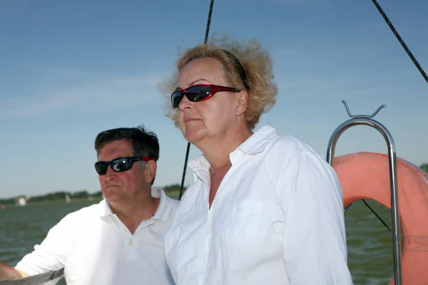 Middle-aged couple on boat sailing — Stock Photo, Image