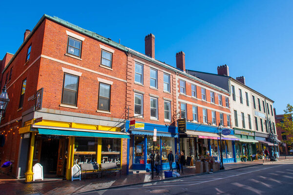 Historic commercial buildings on Market Street in historic city center of Portsmouth, New Hampshire NH, USA.