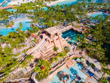 Mayan Temple water slide aerial view including Leap of Faith and Challenger Slide at Adventure Park in Atlantis Hotel on Paradise Island, Bahamas. clipart