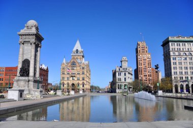 Soldiers and Sailors Monument, Syracuse Savings Bank Building, Gridley Building and State Tower Building at Clinton Square in Syracuse, New York NY, USA. 