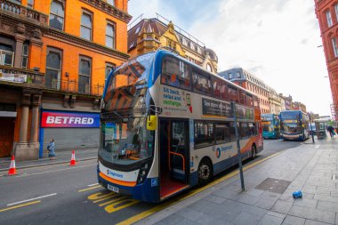 Double deck public bus in city centre of Liverpool, Merseyside, UK. 