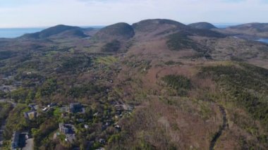 Acadia National Park and Cadillac Mountain aerial view including Bar Harbor town, Bar Island and Porcupine Islands from Frenchman Bay in Maine ME, USA. 