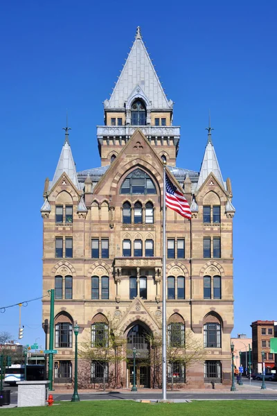 Syracuse Savings Bank Building was built in 1876 with Gothic style at Clinton Square in downtown Syracuse, New York State NY, USA. Now this building is a US National Register of Historic Places.