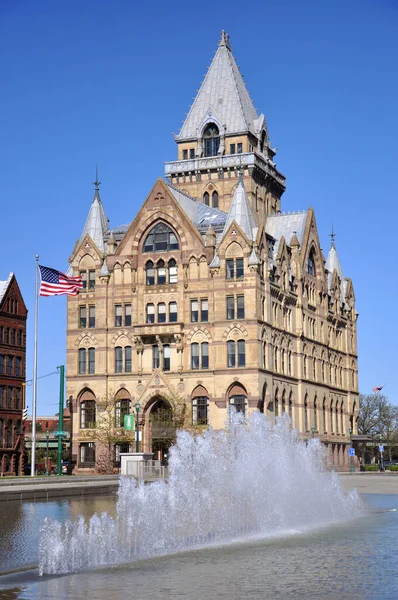 Syracuse Savings Bank Building was built in 1876 with Gothic style at Clinton Square in downtown Syracuse, New York State NY, USA. Now this building is a US National Register of Historic Places.