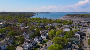 Bar Harbor historic town center aerial view with Cadillac Mountain in Acadia National Park at the background, Bar Harbor, Maine ME, USA. 