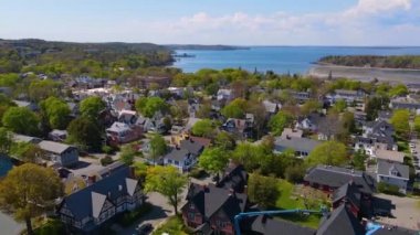 Bar Harbor historic town center aerial view with Cadillac Mountain in Acadia National Park at the background, Bar Harbor, Maine ME, USA. 