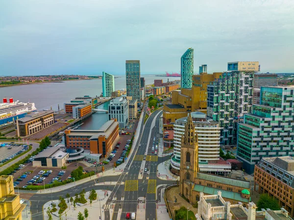 Aerial view of New Quay Road with Liverpool modern skyline at the background at Liverpool, Merseyside, UK. Liverpool Maritime Mercantile City is a UNESCO World Heritage Site.