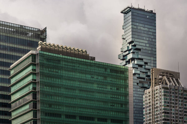 Bangkok, Thailand - Aug 13, 2020 : Detail of Modern Office building in downtown Bangkok. Modern architecture building background good for patterns and backgrounds. Selective focus.