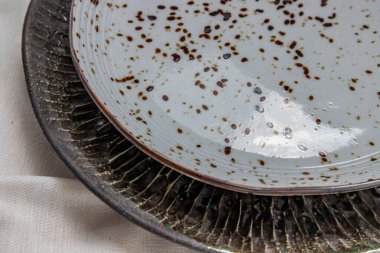 Calico 'daki seramik plakanın ayrıntıları. Seramik sofra takımı, Güzel düzenleme.