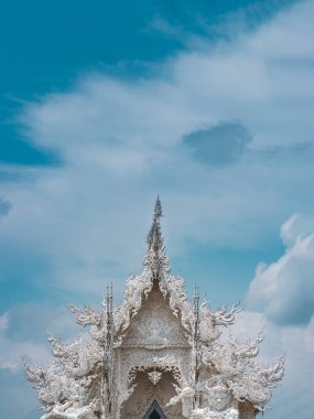 Chiang Rai, Thailand - Sep 05, 2020 : Elaborate sculptures at the famous Wat Rong Khun (White Temple) in Chiang Rai, Thailand. Selective Focus.