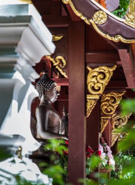 Chiangmai, Thailand - Sep 06, 2020 : Chiang Sace style buddha image singha. Buddha statue at Wat Phra Kaew Mueang Chiang Rai District, Northern part of Thailand. Selective Focus.