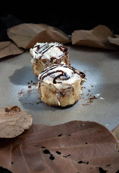 Two Cinnabon Chocobon Soft Chocolate Buns Topped Rich Cream Cheese — Stockfoto