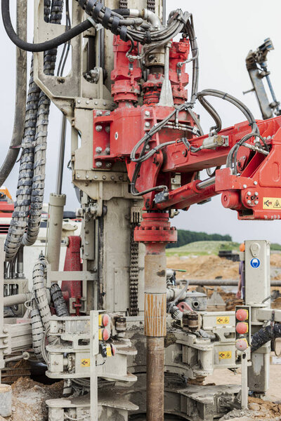 Drilling rig close-up at a construction site. Deep hole drilling. Extraction of minerals oil and gas. Working process