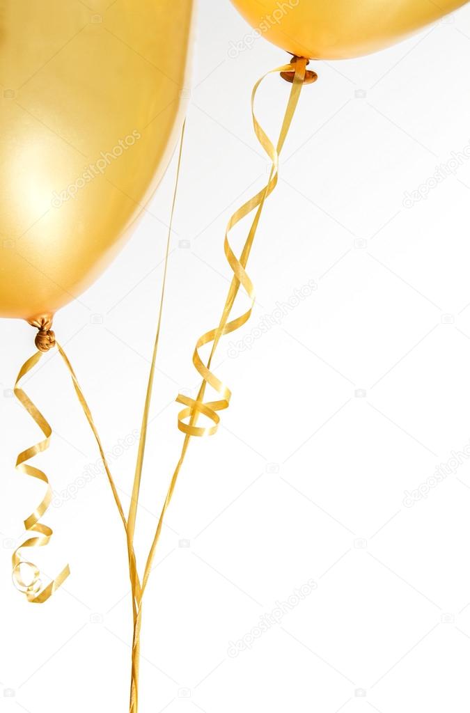 Gold balloons and ribbon