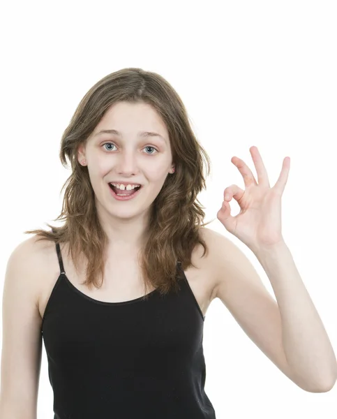 Young girl making an ok hand gesture — Stock Photo, Image