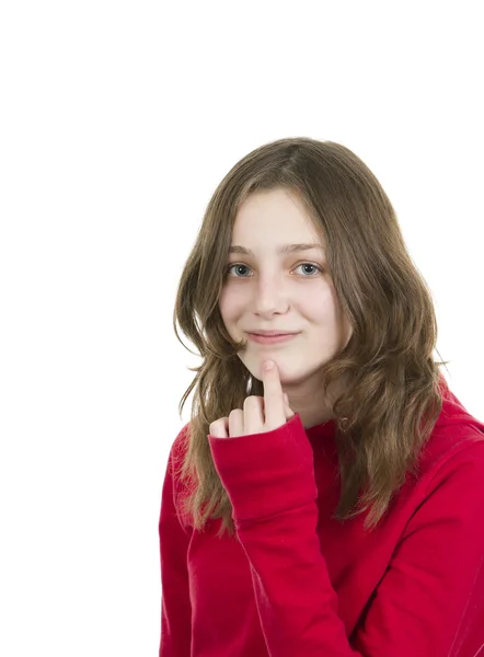 Jong meisje met vinger op kin — Stockfoto